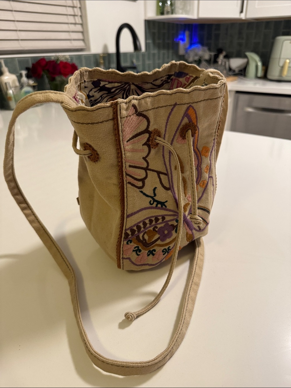 Lucky Brand Beige Canvas Drawstring Crossbody with Colorful Embroidery Design